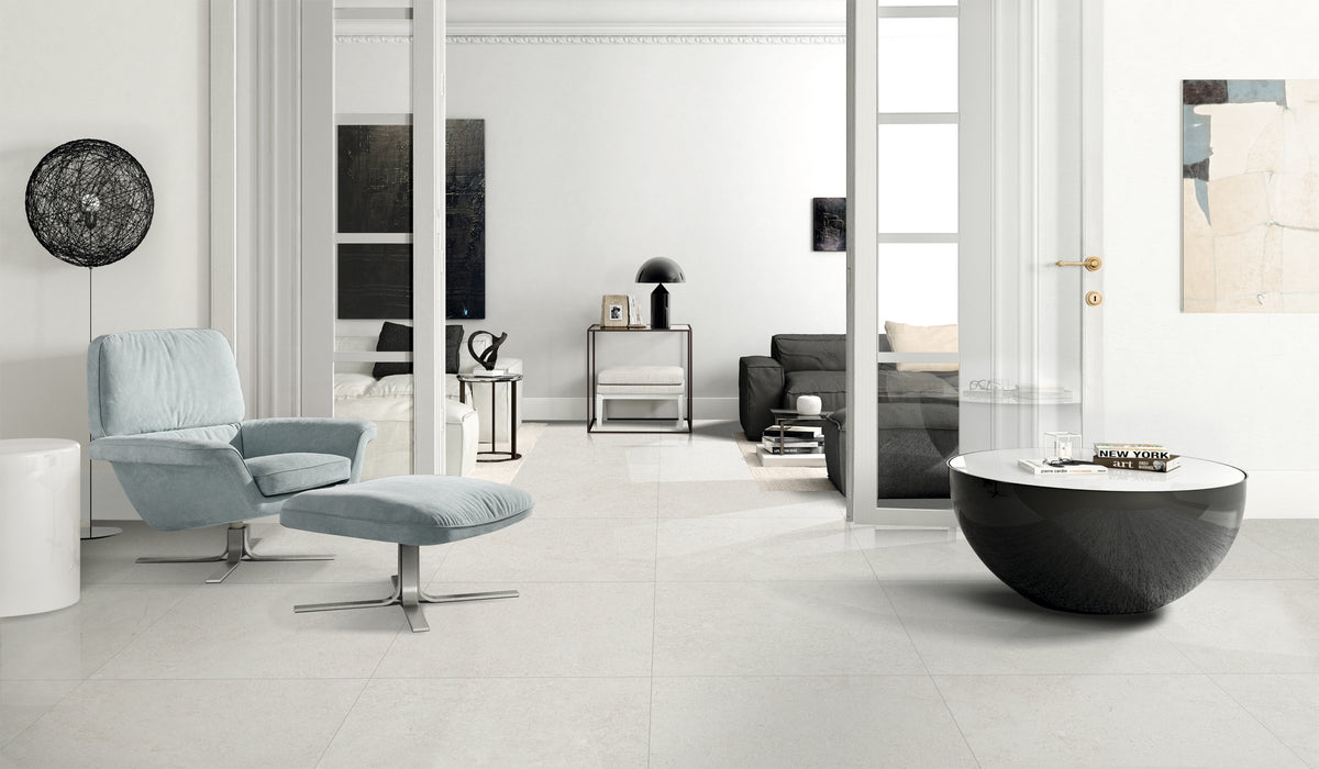 Elsinora White matt porcelain tile, 300 x 600 mm, featuring a light white surface with fine grey and beige speckling and subtle texture.