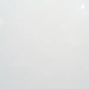 Calista White gloss porcelain tile, 300 x 600 mm, with a clean white surface and reflective glossy finish.