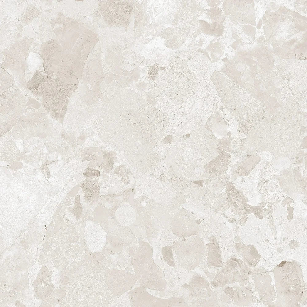 Darlina Ivory matt porcelain tile in a 600 x 600 mm format, with warm ivory tones and subtle beige detailing for a timeless interior look.