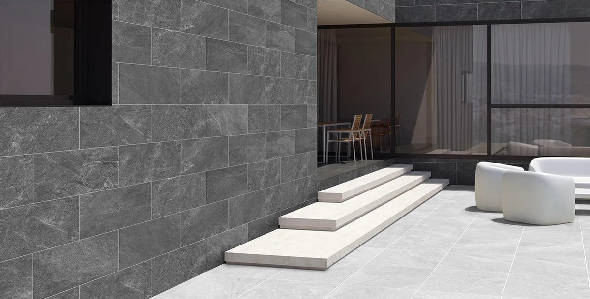 Merovia White Matt Porcelain Tile 300 x 600 mm with a pale white surface, subtle grey tonal variations and softly blended markings.