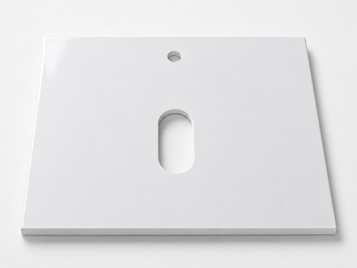 White rectangular stone top with a basin cutout and a tap hole cutout